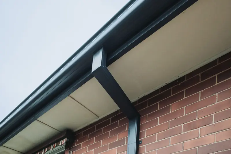 Colorbond gutter and downpipe close-up